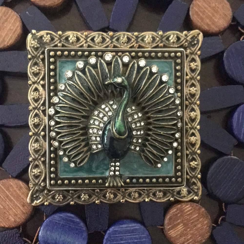Artisan peacock brooch